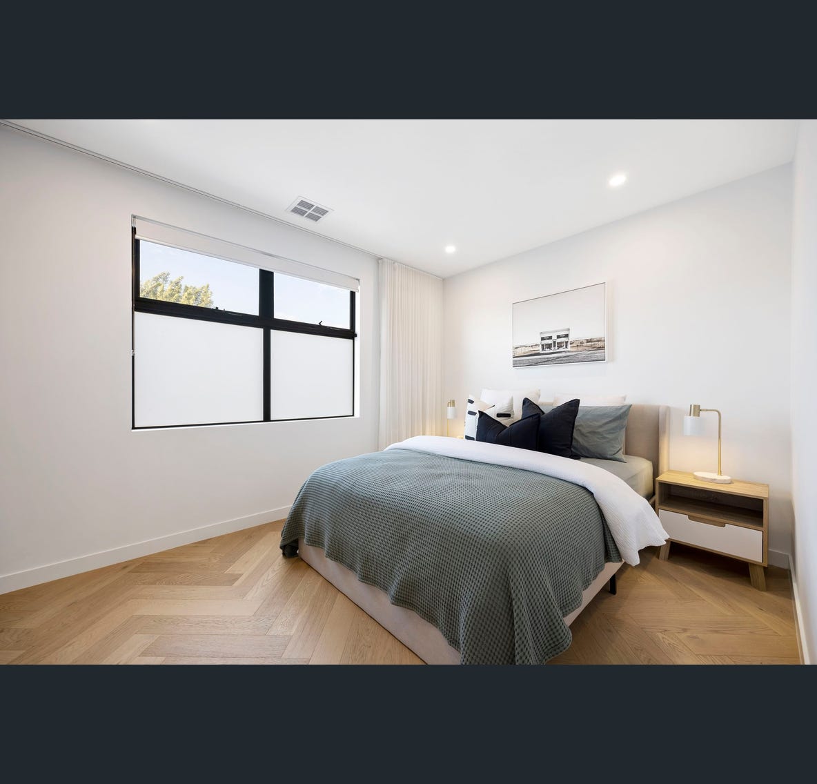 Second bedroom — herringbone oak