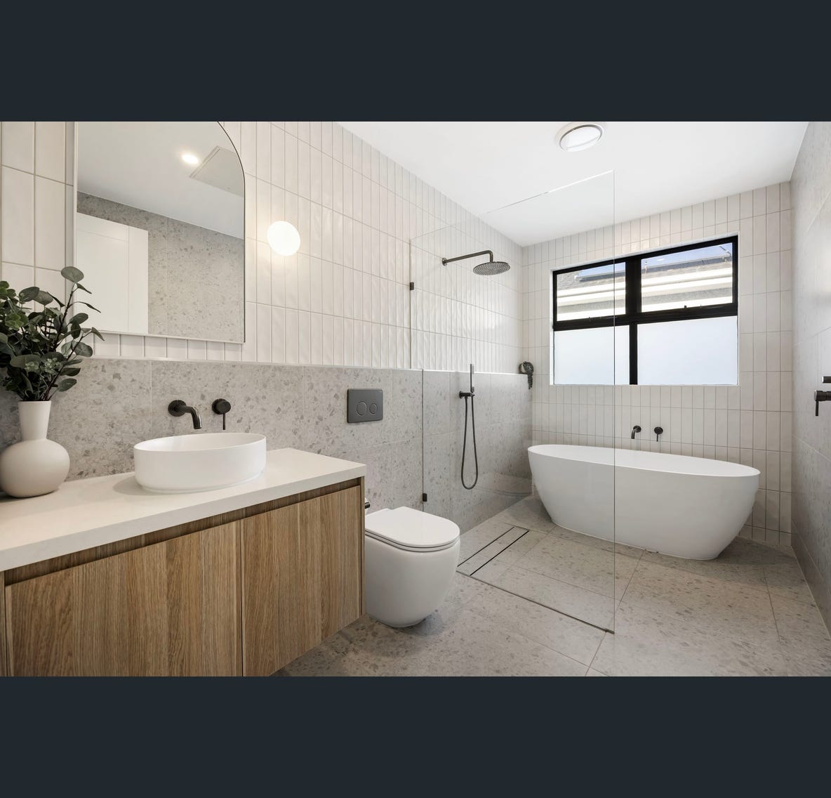 Main bathroom — freestanding bath & terrazzo
