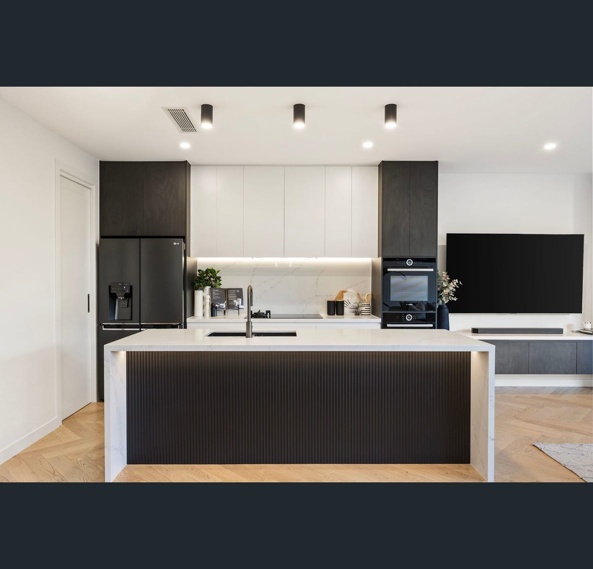 Gourmet kitchen — dark cabinetry & island